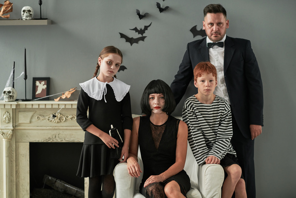 Parents and Their Children in Halloween Costumes